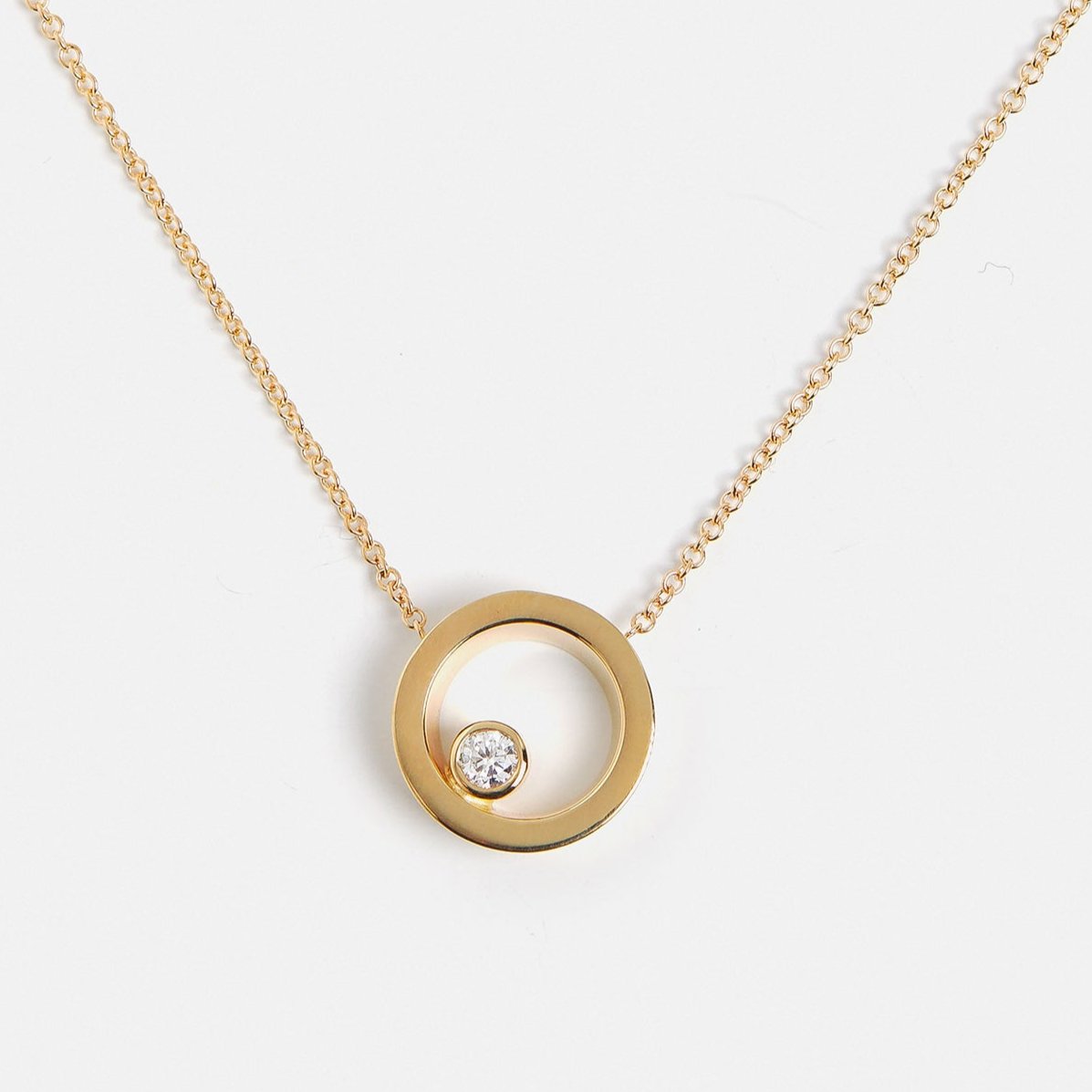 Cool necklace with delicate chain and asymmetrical pendant with lab created white diamond in 14 karat gold by SHW best fine jewelry NYC