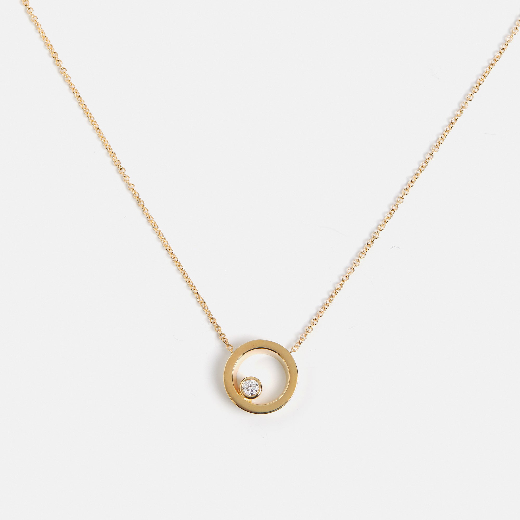 Unique necklace with dainty chain and circle pendant with lab grown white diamond in solid 14k gold by SHW cool fine jewelry store in NYC