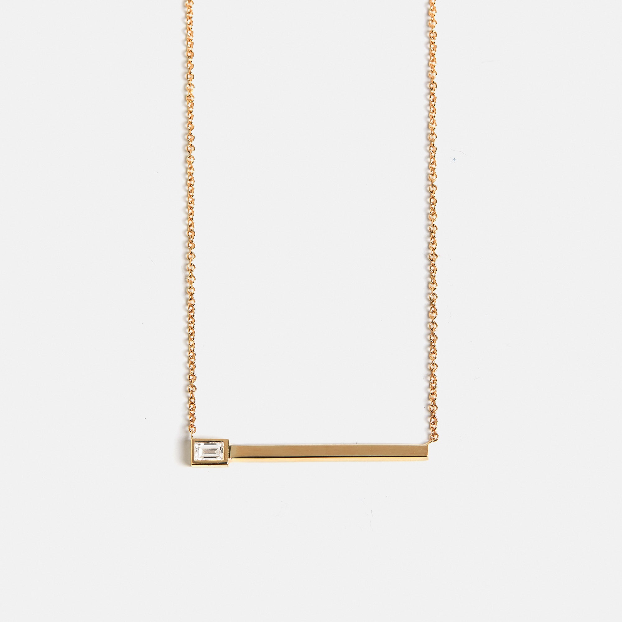 Unique necklace with dainty chain and bar pendant with baguette cut lab grown white diamond in solid 14k gold by SHW cool fine jewelry NYC