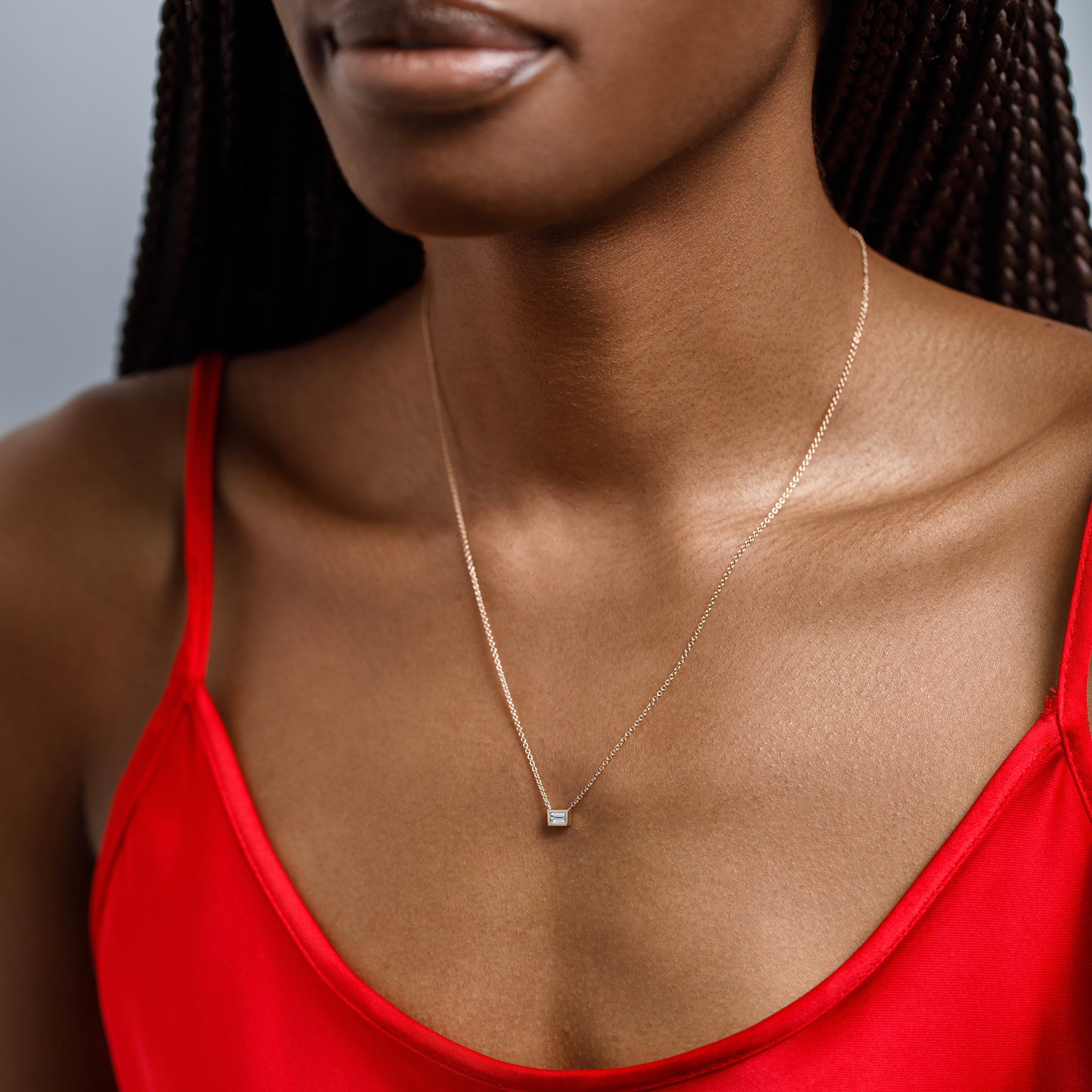 Designer necklace with dainty chain and simple pendant with lab grown baguette white diamond in 14k or 18k gold by SHW jewelry store in NYC