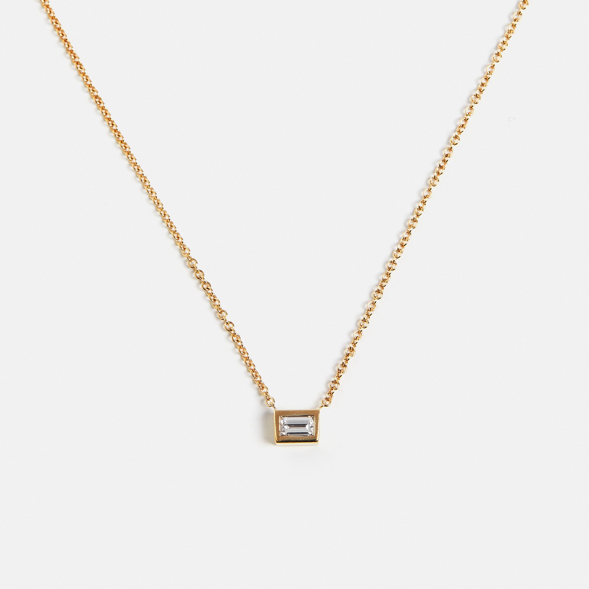 Unique necklace with dainty chain and pendant with baguette cut lab grown white diamond in solid 14k gold by SHW cool fine jewelry NYC