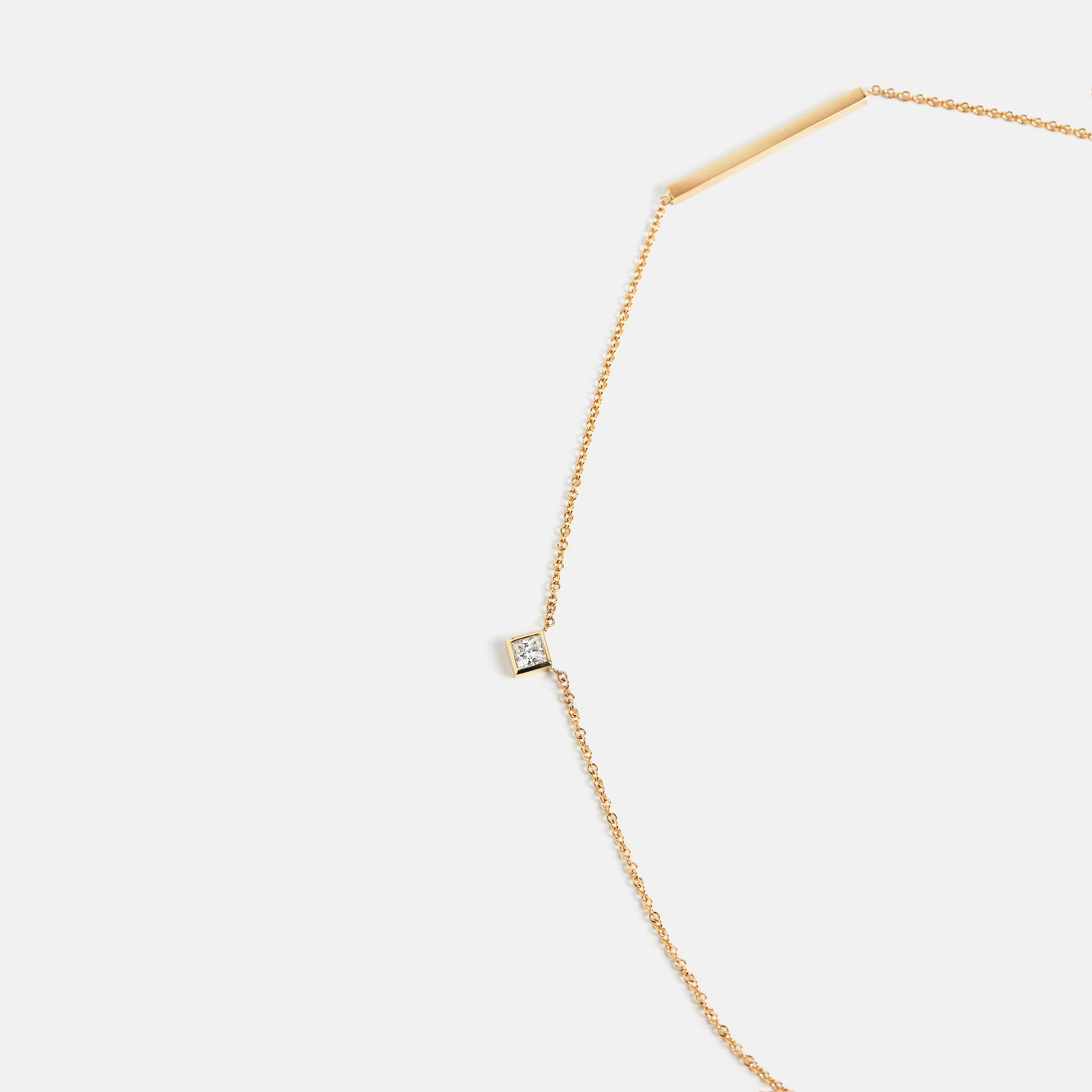 Unique delicate 18 inch chain necklace with princess cut lab white diamond in 14 karat gold by SHW best fine jewelry store in downtown NYC