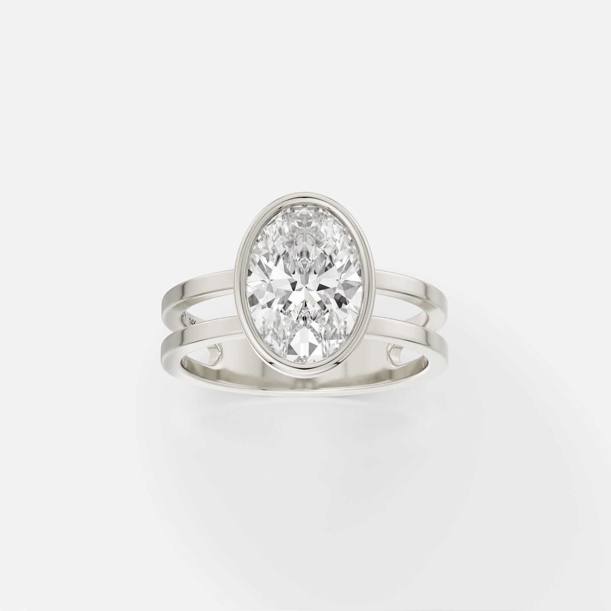 14k white gold double band engagement ring with 2 carat oval diamond set north south in thin bezel