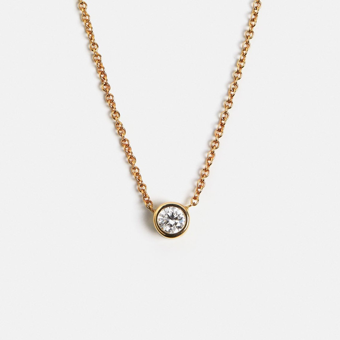 Simple delicate 18 inch chain necklace with round lab white diamond pendant in 14 karat gold by SHW best fine jewelry stores in NYC near me