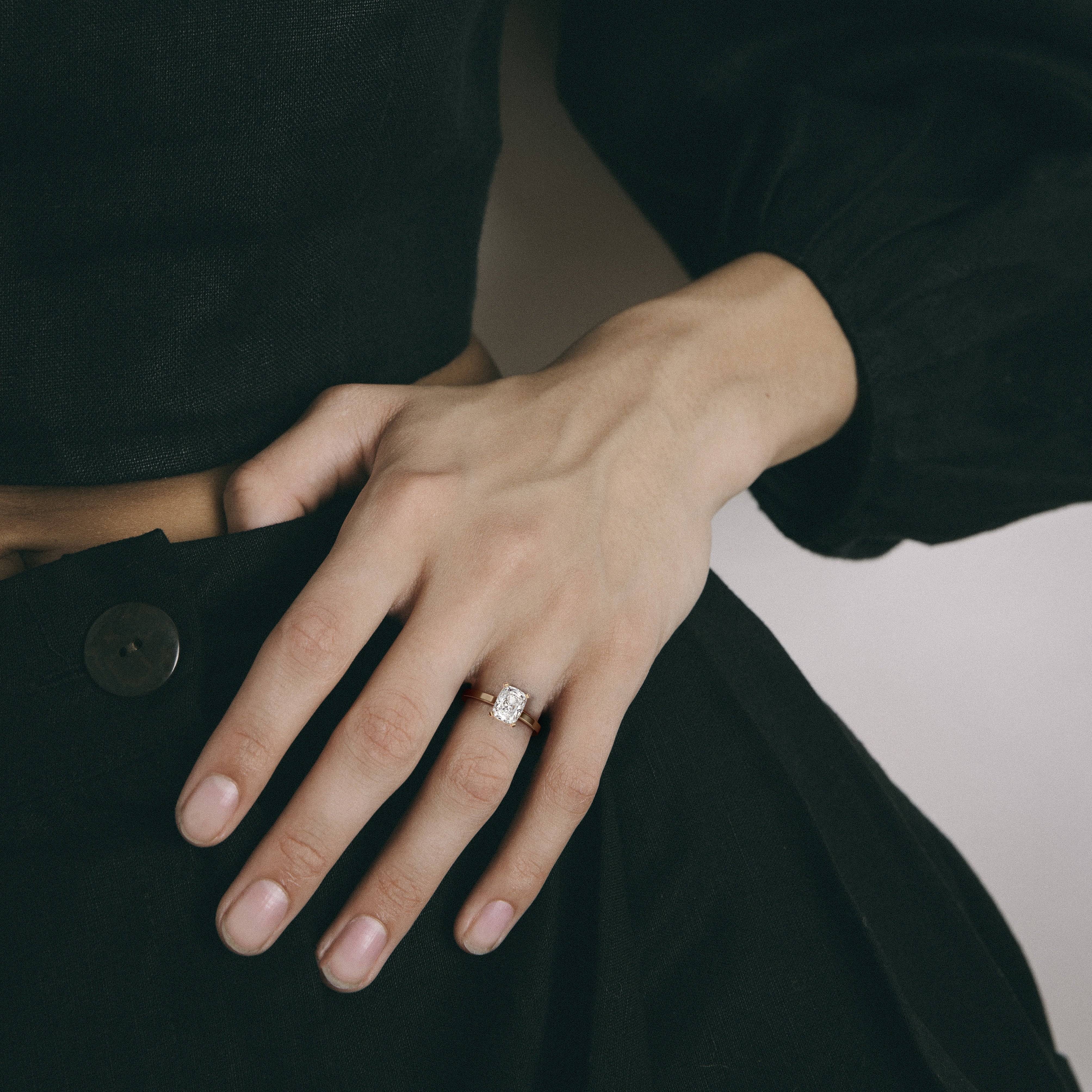 Contemporary cushion solitaire ring with vertical setting and thin flat band 14k 18k SHW best jewelry stores NYC