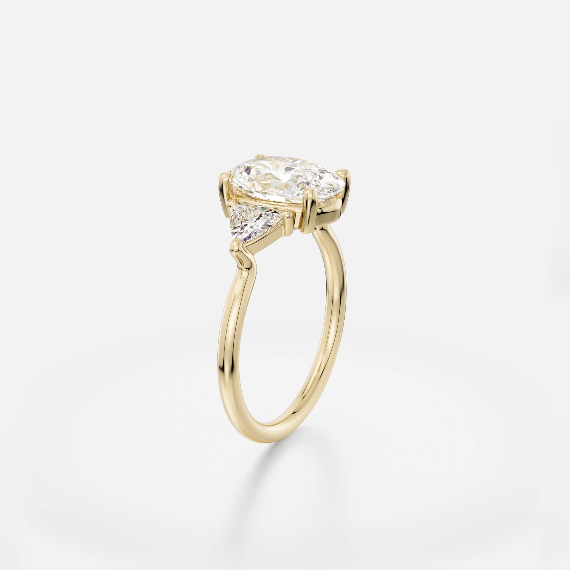 2.50 carat oval diamond engagement ring with trillion side stones in delicate prong cluster setting