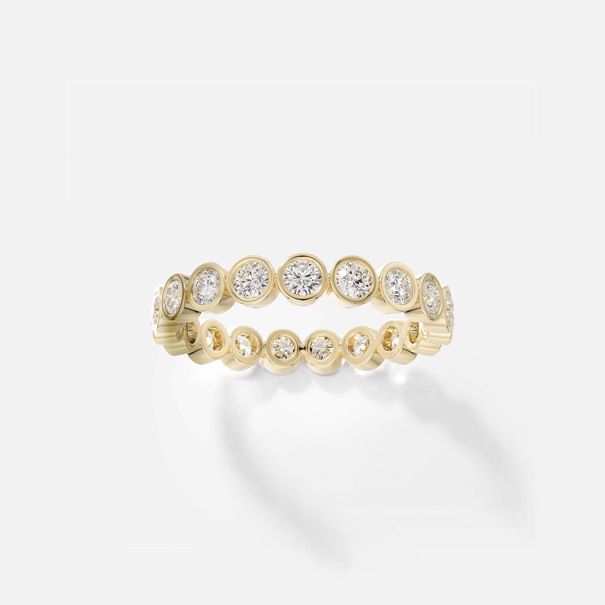 14k yellow gold wedding band with bezel-set round white diamonds