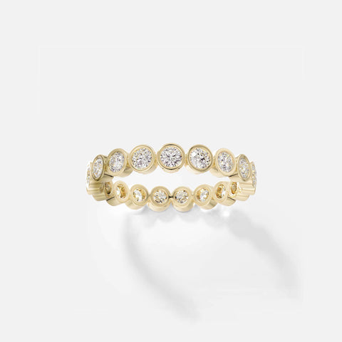 14k yellow gold wedding band with bezel-set round white diamonds