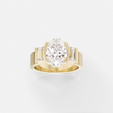 A sculptural three stone engagement ring with an oval diamond and baguette side stones set in partial bezels on a clean flat band.