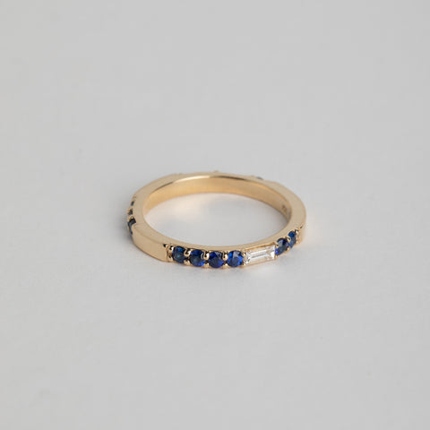 14k yellow gold 2mm eternity band with round sapphires and white diamond baguettes