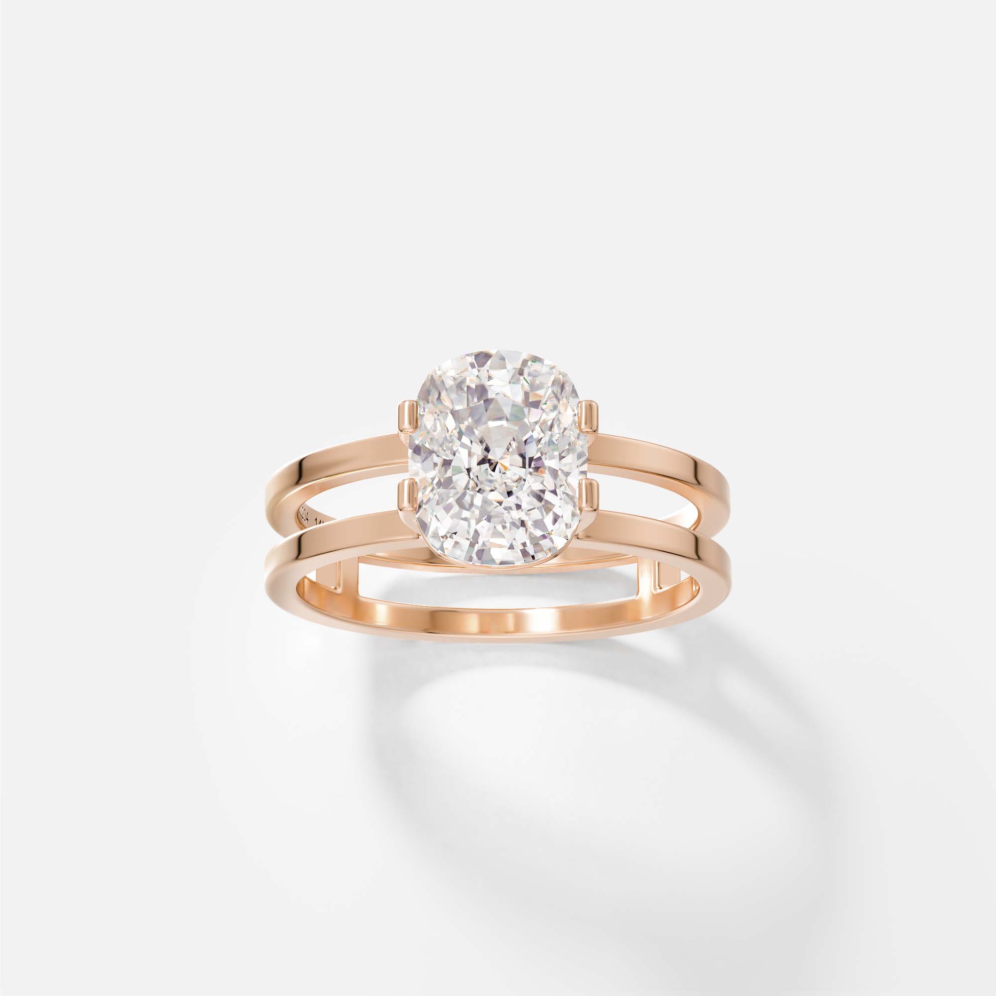 14k rose gold sculptural double band engagement ring with cushion-cut diamond