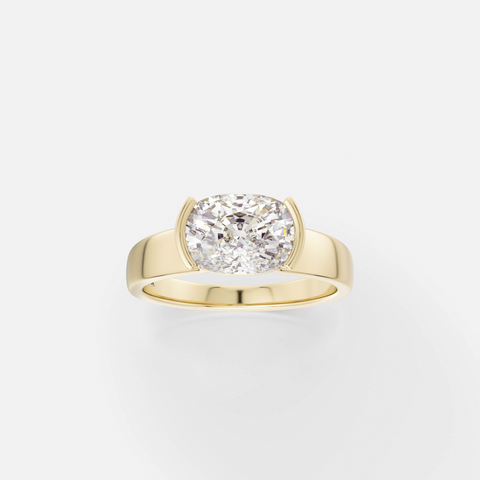 14k yellow gold engagement ring with 2.00 carat east-west cushion-cut diamond in tapering partial bezel on tapered band
