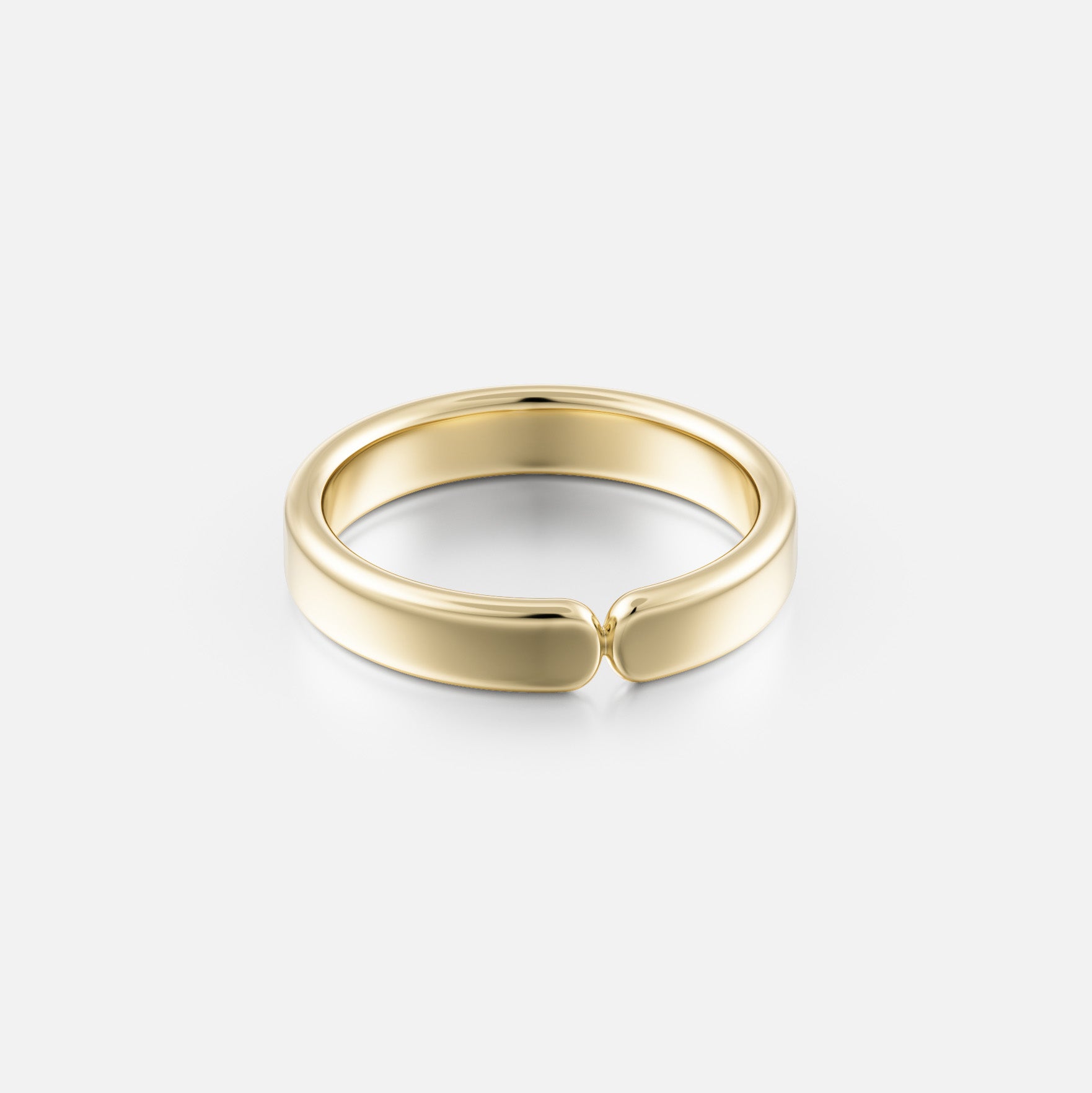 14k yellow gold wedding band with a sculptural modern profile