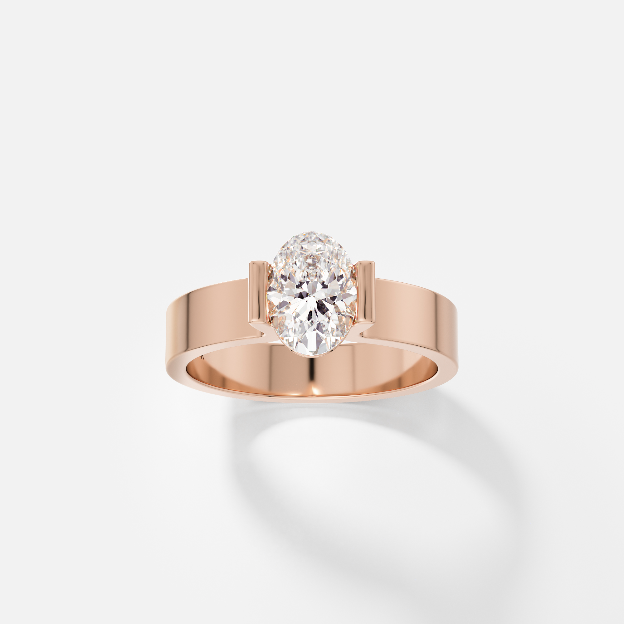 14k rose gold sculptural engagement ring with oval diamond in partial bezel setting