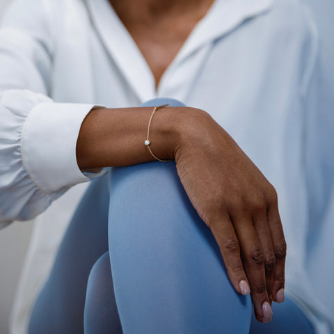 Modern gold bracelet with aquamarine gemstone and sleek bar accent 14k 18k fine jewelry March birthstone SHW NYC