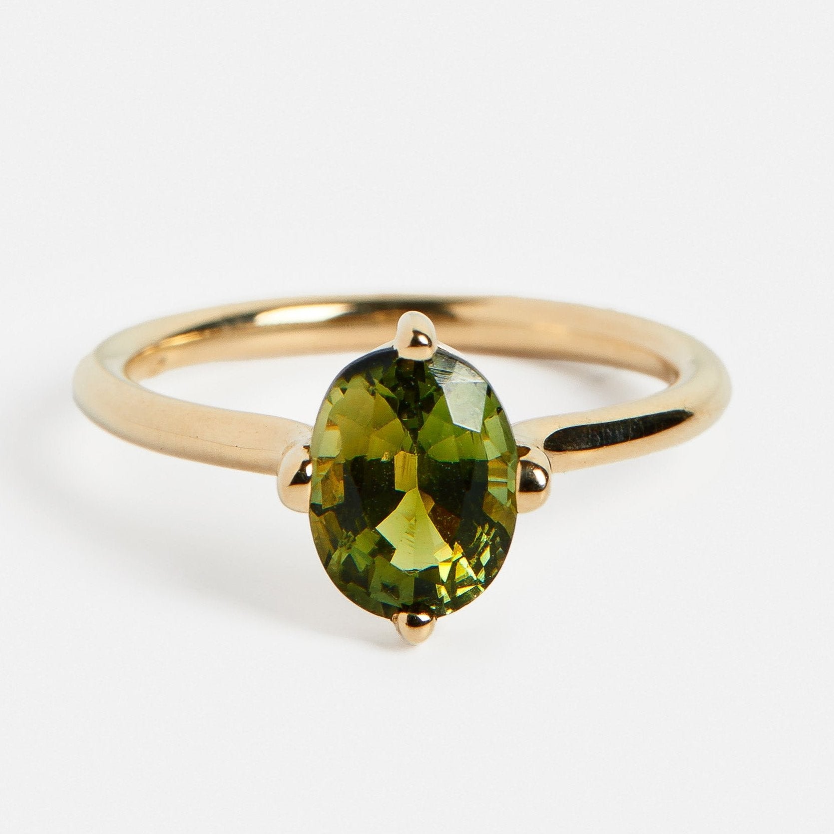 Unique engagement ring setting with 1.5ct north south oval earth tone gemstone green tourmaline in 14k gold by SHW fine jewelry NYC nearby