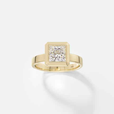 14k yellow gold wide flat band engagement ring with 1.50 carat princess-cut diamond in thick bezel setting