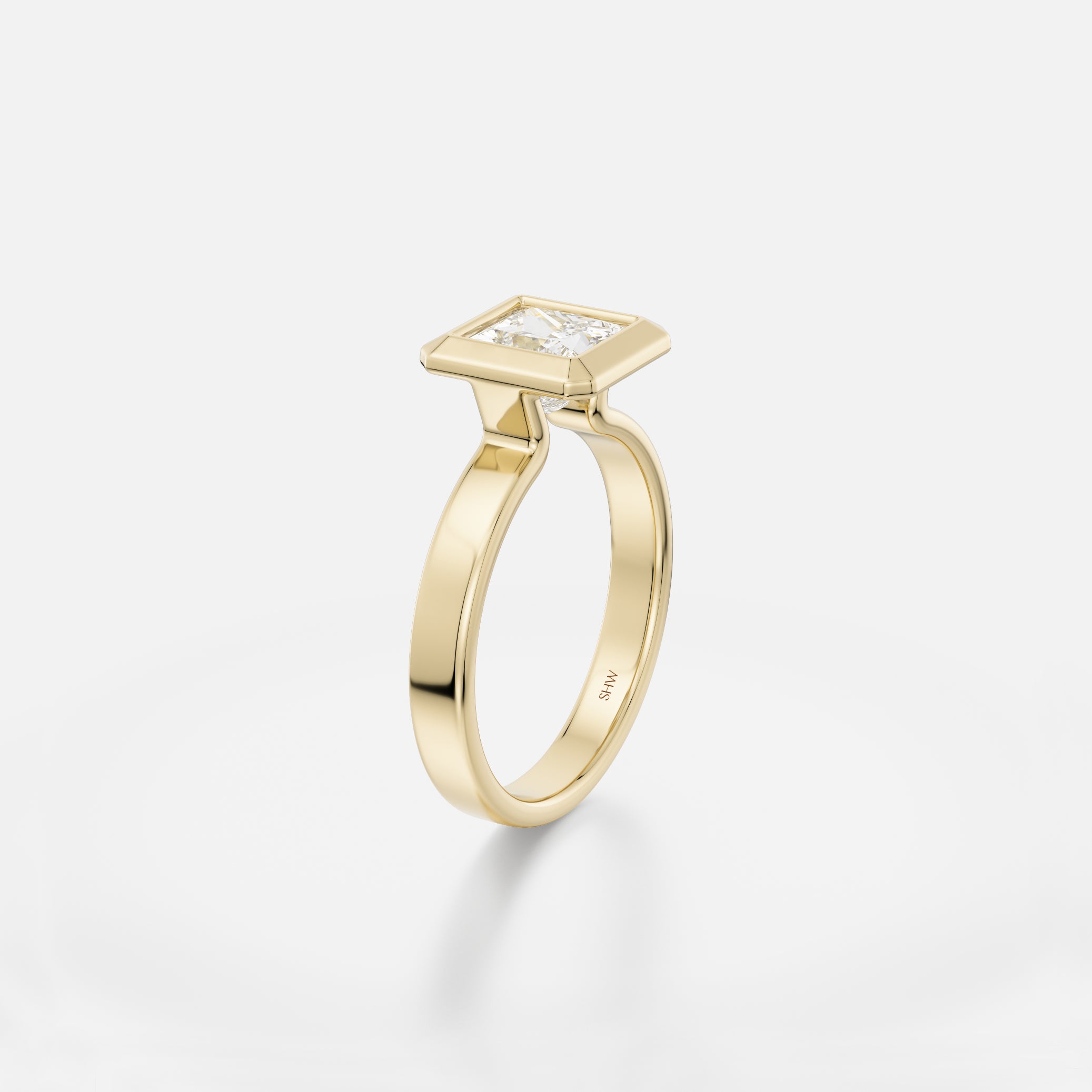 Modern flat profile engagement ring with thick bezel holding 1.5 ct princess-cut diamond