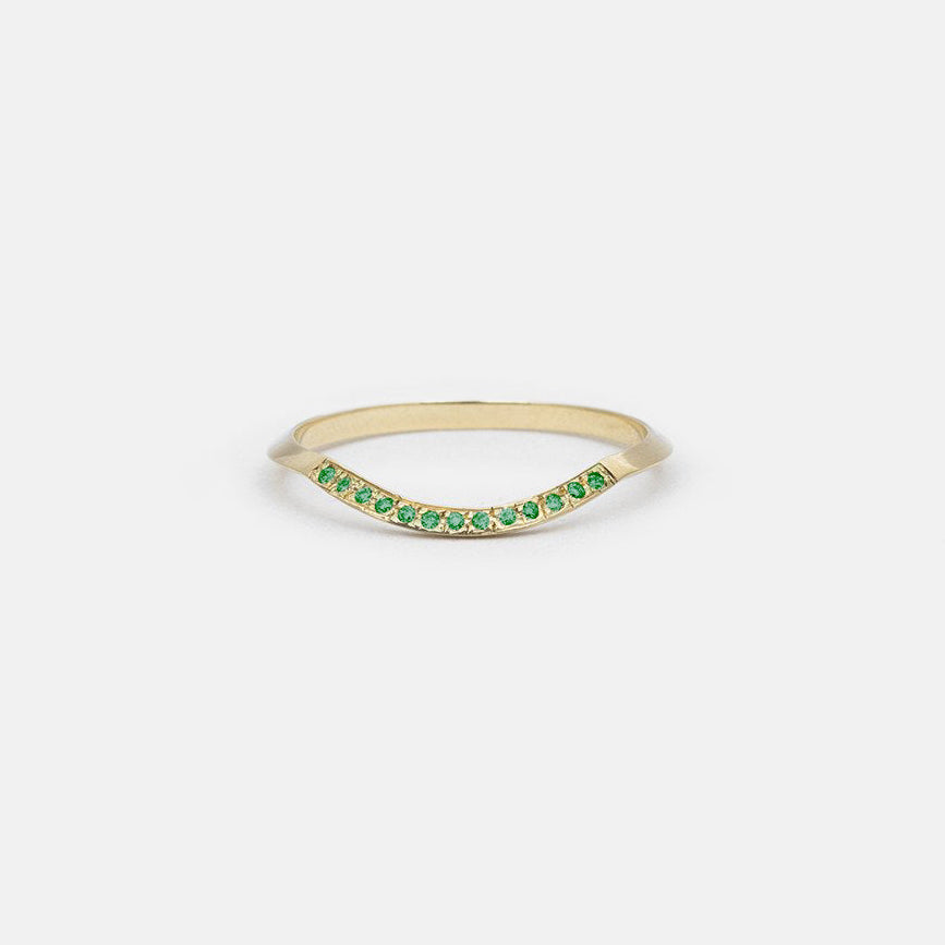 14k yellow gold knife edge wedding band with pavé emeralds