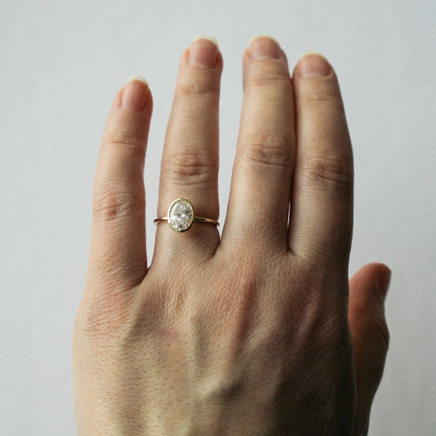 Artu Minimalist Ring in 14 karat yellow Gold set with 1.51ct oval cut lab-grown diamond By SHW Fine Jewelry NYC