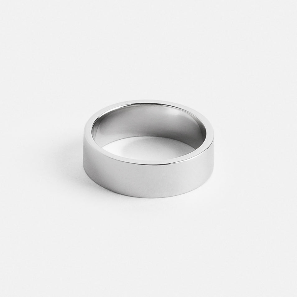 Close view of a wide platinum flat band with clean edges