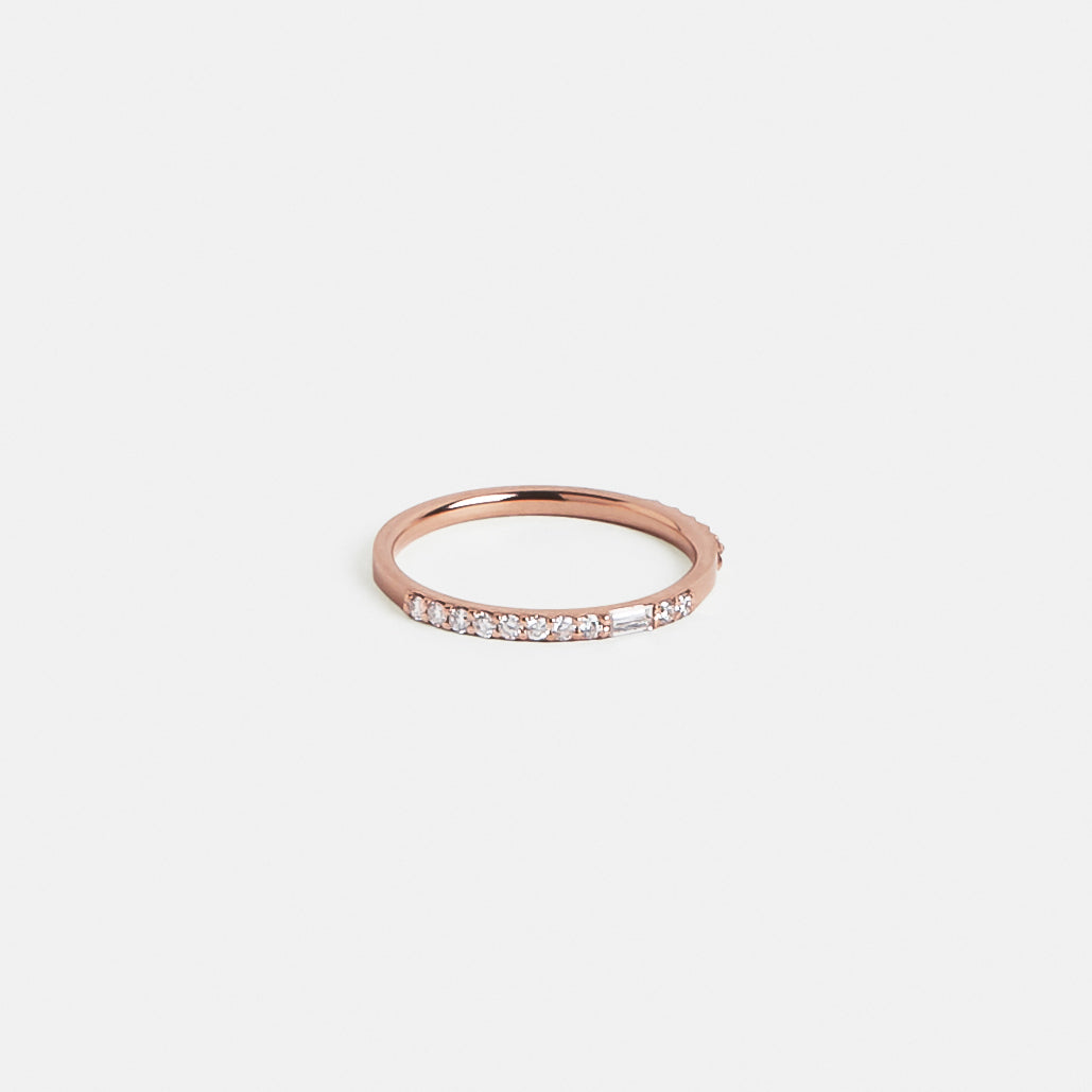 14k rose gold thin diamond wedding band with asymmetrical layout
