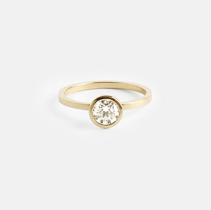 Cool Bezel Setting Engagement Ring with one carat laboratory manufactured diamond in 14k yellow gold by SHW famous fine jewelry stores NYC