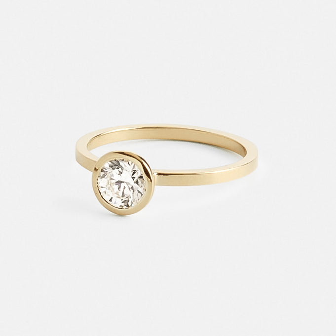 Minimalist Thin Band Engagement Ring with 1.0ct round brilliant cut lab grown diamond in 14k yellow gold by SHW fine jewelry stores in NYC