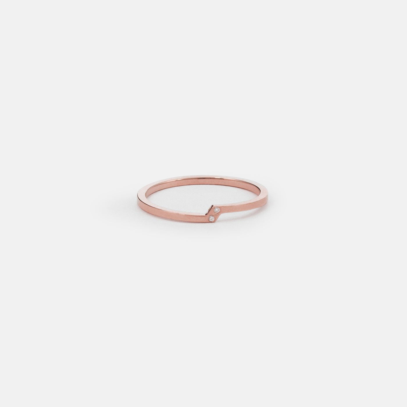 14k rose gold delicate ring with two diagonal white diamonds