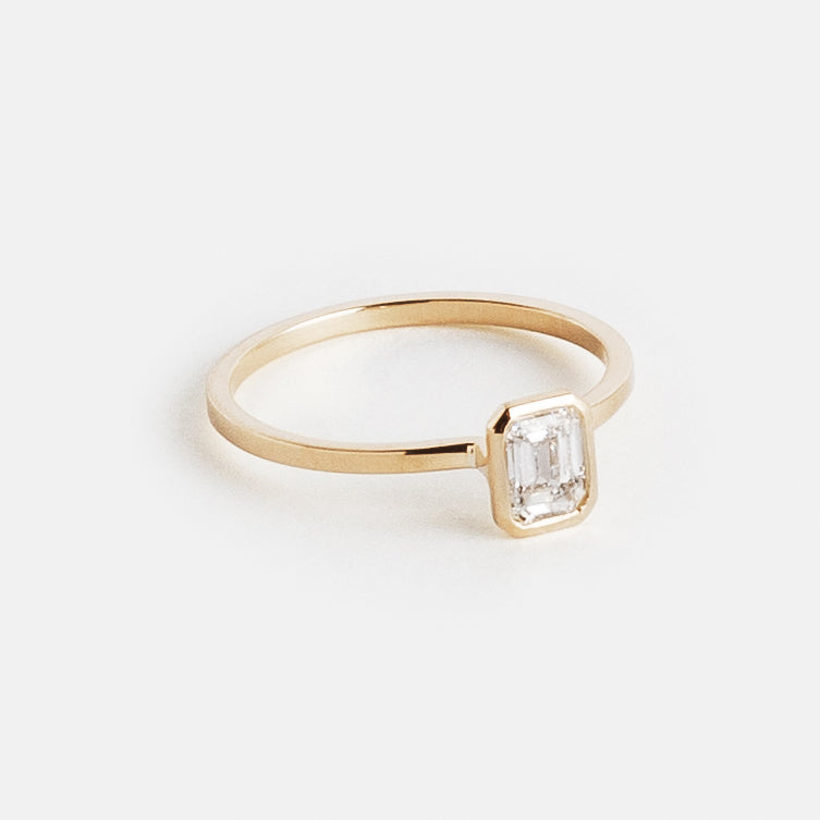 Auda Designer Ring in 14k Gold set with an emerald cut natural diamond By SHW Fine Jewelry NYC