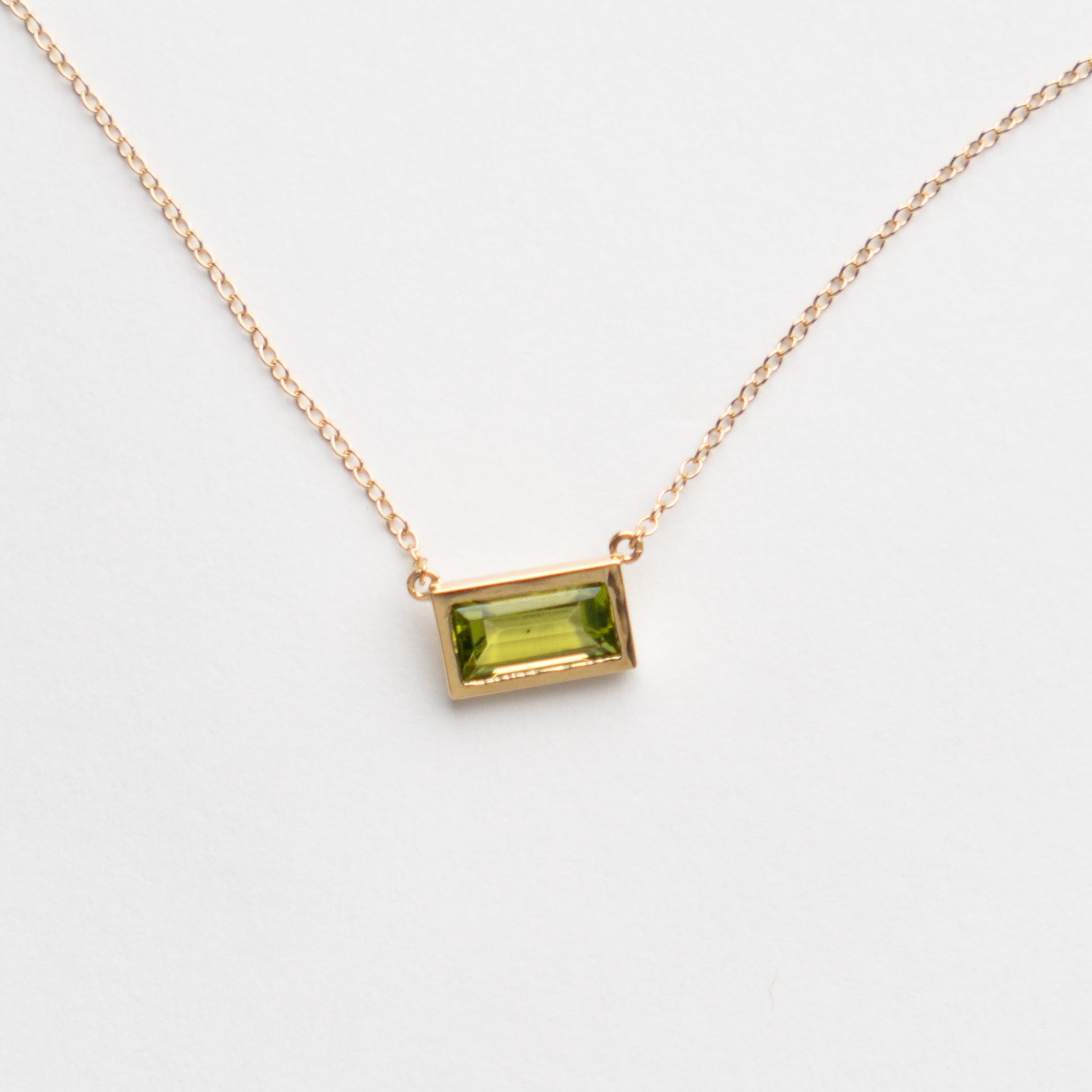 Unique Didi necklace in 14 karat gold set with peridot made in NYC by SHW fine Jewelry