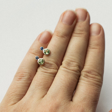 Kiki alternative stud earrings in 14k gold set with peridot and sapphire