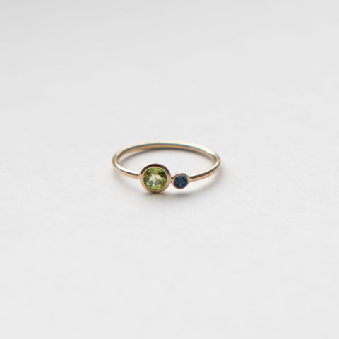 Kiki nontraditional ring in 14k gold set with peridot and sapphire