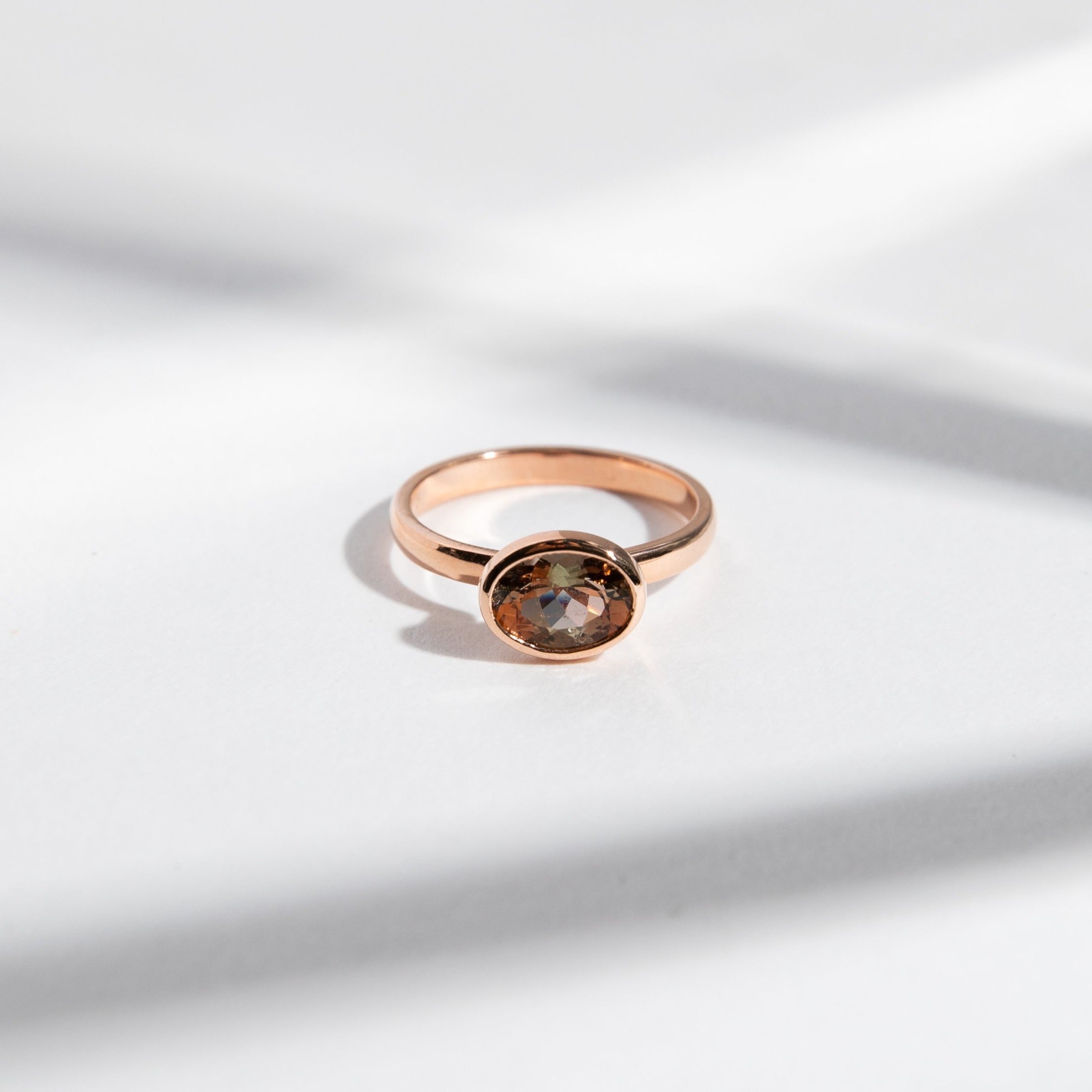 Syd Unconventional Ring in 14k Gold set with a 1.2ct oval cut andalusite By SHW Fine Jewelry NYC