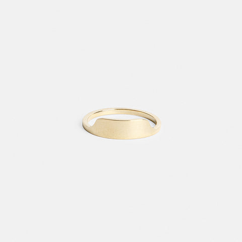 14k yellow gold thin ring with shield-shaped front detail