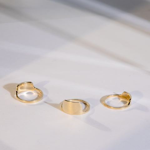 Tylo gold ring shown alongside two complementary rings